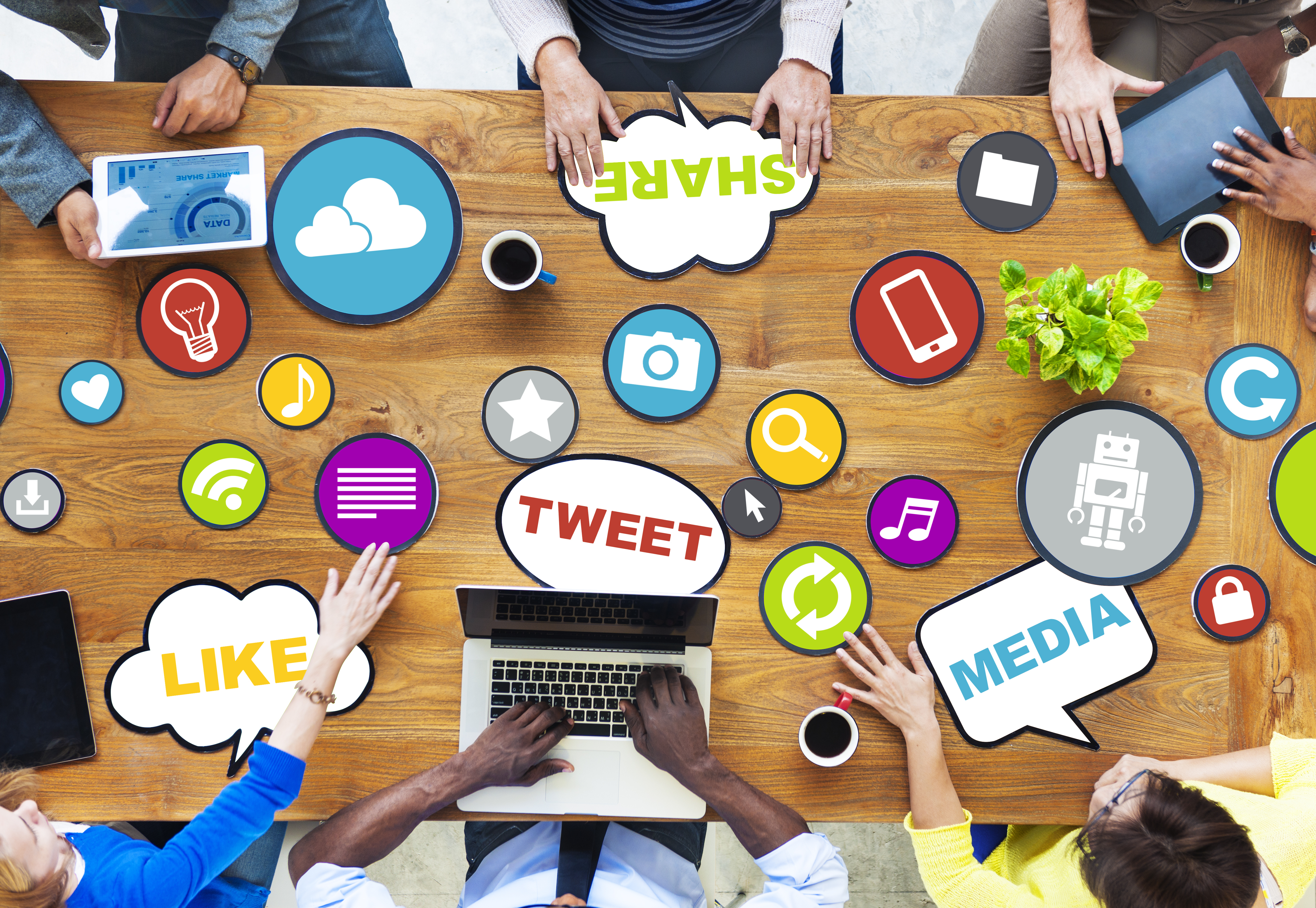 Social media marketing image. Meeting with people at a table with words tweet, like , media and share.